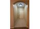 View of a well-lit entryway featuring neutral paint and tile flooring at 12016 Villanova Dr # 102, Orlando, FL 32837