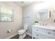Clean, updated bathroom featuring a modern vanity, stylish mirror, and neutral decor at 13028 Auburn Cove Ln, Orlando, FL 32828