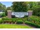 Elegant Avalon Park entrance sign surrounded by vibrant greenery and manicured landscaping at 13028 Auburn Cove Ln, Orlando, FL 32828