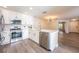 Bright, updated kitchen featuring stainless steel appliances, white cabinets, and sleek countertops at 13028 Auburn Cove Ln, Orlando, FL 32828
