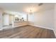 Open-concept living space blending seamlessly into the kitchen area, creating an inviting atmosphere at 13028 Auburn Cove Ln, Orlando, FL 32828