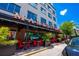 Outdoor restaurant seating beneath the 'Marketplace' sign offers a charming dining experience at 13028 Auburn Cove Ln, Orlando, FL 32828