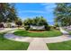 Landscaped entrance to the Lake Preserve Park community with welcoming signage at 14124 Dove Hollow Dr, Orlando, FL 32824