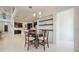 Open concept dining area leads to a kitchen and features modern pendant lighting and an open layout at 14124 Dove Hollow Dr, Orlando, FL 32824