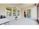 Screened-in lanai offers views from the interior with tiled floors and provides access to the home's interior at 14124 Dove Hollow Dr, Orlando, FL 32824