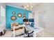 Vibrant office space boasts a modern design, ample natural light, and stylish decor for a productive atmosphere at 14124 Dove Hollow Dr, Orlando, FL 32824
