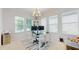 Bright office space with natural light, large windows and a neutral color scheme for a professional environment at 14124 Dove Hollow Dr, Orlando, FL 32824