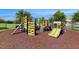 Community playground featuring slides, climbing wall, and play equipment at 14124 Dove Hollow Dr, Orlando, FL 32824