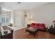 Inviting living room with hardwood floors and comfortable seating and high ceilings at 1542 Wescott Loop, Winter Springs, FL 32708