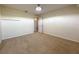 Carpeted bedroom with a ceiling light and a neutral color palette at 1546 Water Elm Ct, Orlando, FL 32825