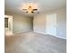 Bedroom featuring carpeted floors and neutral paint at 1546 Water Elm Ct, Orlando, FL 32825