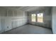 Bright bedroom with large windows, providing ample natural light and scenic views at 1635 Cane Bamboo Drive, St Cloud, FL 34771