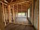 Framing of new home construction showing block walls, and concrete flooring at 1635 Cane Bamboo Drive, St Cloud, FL 34771