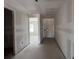 Hallway featuring plasterboard walls at 1635 Cane Bamboo Drive, St Cloud, FL 34771