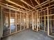 Interior view of exposed wood frame, concrete flooring and cinder block walls at 1635 Cane Bamboo Drive, St Cloud, FL 34771