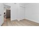 Empty bedroom featuring wood floors and a closet, offering a blank canvas for personalization and comfort at 167 S Sheridan Ave, Deland, FL 32720