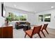 Sun-filled living room with contemporary decor, neutral tones, and an open layout at 167 S Sheridan Ave, Deland, FL 32720