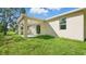 Exterior backyard showing covered patio at 17 Cypress Run, Haines City, FL 33844