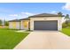 Charming single-story home featuring a spacious two-car garage and well-manicured lawn at 17315 Sw 26Th Terrace Rd, Ocala, FL 34473