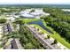 Beautiful aerial view of community featuring serene pond and lush greenery at 2021 Sweet Birch Ln, Orlando, FL 32828