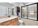The bathroom offers a soaking tub, shower, and vanity, ideal for relaxation at 2021 Sweet Birch Ln, Orlando, FL 32828