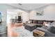 Comfortable living room featuring an open layout and wood flooring at 2021 Sweet Birch Ln, Orlando, FL 32828