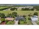 Stunning aerial view of the home, showcasing its location in a desirable neighborhood near the water at 209 7Th S St, Haines City, FL 33844