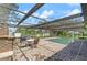 This home features a covered brick patio with an outdoor kitchen and pool, perfect for entertaining guests at 209 7Th S St, Haines City, FL 33844