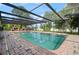 This home features a screened pool with brick patio for outdoor enjoyment at 209 7Th S St, Haines City, FL 33844