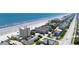 Beautiful aerial view of a beachfront condo with community parking and panoramic coastal views at 2121 Hill St # 7B, New Smyrna Beach, FL 32169