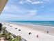 Expansive view of the beach with clear blue water and sky at 2121 Hill St # 7B, New Smyrna Beach, FL 32169