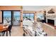 Living room with beach view, balcony, and a decorative fireplace at 2121 Hill St # 7B, New Smyrna Beach, FL 32169