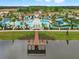 A full community aerial view showcasing resort-style pool, amenities, and waterfront access at 2121 Morocco Way, Kissimmee, FL 34747