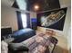 Spacious themed bedroom with two twin beds, Star Wars accent wall, and modern furnishings at 2121 Morocco Way, Kissimmee, FL 34747