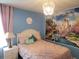 A bedroom featuring a fairytale theme and a crystal chandelier at 2121 Morocco Way, Kissimmee, FL 34747