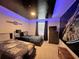 Themed bedroom with starry ceiling, Star Wars decor, and cozy twin beds; designed for fun and imagination at 2121 Morocco Way, Kissimmee, FL 34747