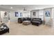 Relaxing upstairs living room with comfortable seating and entertainment area at 2121 Morocco Way, Kissimmee, FL 34747