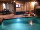 Inviting outdoor pool and patio area with comfortable seating, perfect for relaxing and entertaining by the water at 2121 Morocco Way, Kissimmee, FL 34747