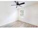 Bedroom featuring hardwood flooring, ceiling fan and natural light at 2211 J Lawson Blvd, Orlando, FL 32824