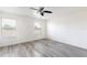 Bright bedroom featuring wood floors and natural light at 2211 J Lawson Blvd, Orlando, FL 32824