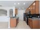 Bright kitchen featuring stainless steel appliances, granite countertops, and tile backsplash at 2211 J Lawson Blvd, Orlando, FL 32824