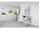 Bright foyer with a desk, stairs and a decorative wall hanging at 2380 Celebration Blvd, Celebration, FL 34747
