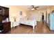 Cozy bedroom features hardwood floors and well-lit spaces at 26 Canter Club Ct, Debary, FL 32713
