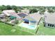 Overhead view of backyard with pool, patio, and fenced yard, surrounded by lush landscaping at 2622 Clarinet Dr, Orlando, FL 32837