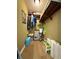 Compact walk-in closet with an upper shelf offering plenty of storage space, kept in clean condition at 2622 Clarinet Dr, Orlando, FL 32837