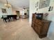 Bright living room featuring a piano, tile floors, and comfortable seating, perfect for entertaining at 2622 Clarinet Dr, Orlando, FL 32837
