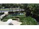 Pond with a fountain, bridge, seating area and beautiful landscaping at 2622 Clarinet Dr, Orlando, FL 32837