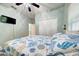 Cozy bedroom featuring a large bed, ceiling fan, and ample closet space, creating a comfortable retreat at 3142 Dark Sky Dr, Harmony, FL 34773