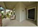Welcoming covered porch with cozy seating, perfect for enjoying a cup of coffee or greeting guests at 3142 Dark Sky Dr, Harmony, FL 34773
