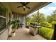 Enjoy outdoor living on this screened-in patio with a grill and seating area at 3142 Dark Sky Dr, Harmony, FL 34773